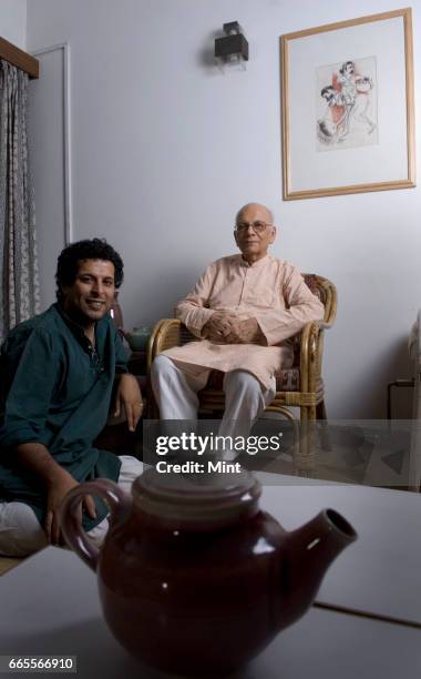 Year old potter and Gandhian Devi Prasad, whose show of 300 of his works will open at Lalit Kala Academy on May 1, poses for camera with his student...