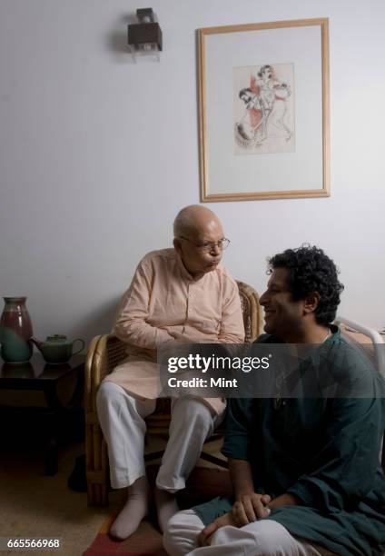 Year old potter and Gandhian Devi Prasad, whose show of 300 of his works will open at Lalit Kala Academy on May 1, poses for camera with his student...