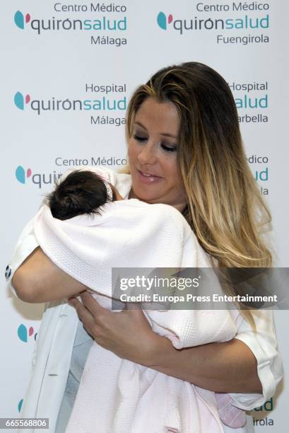 Rubin Kazan football player Sergio Sanchez's wife the model Elisabeth Reyes presents her newborn child at Quiron hospital on April 6, 2017 in Malaga,...