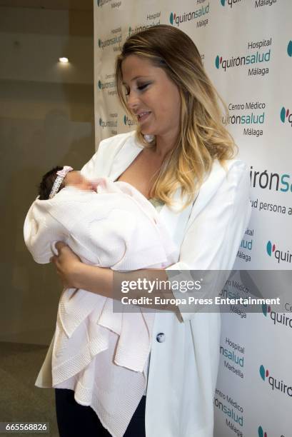 Rubin Kazan football player Sergio Sanchez's wife the model Elisabeth Reyes presents her newborn child at Quiron hospital on April 6, 2017 in Malaga,...