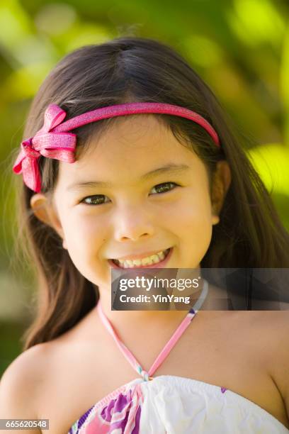 young girl hawaiian polynesian children in tradition clothing - hawaiian print dress stock pictures, royalty-free photos & images