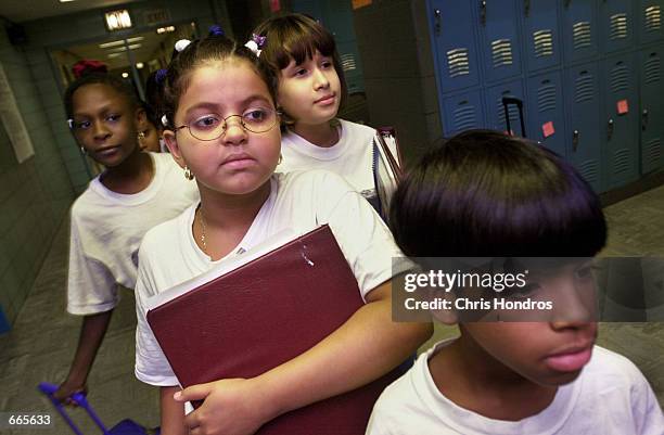 Students at "Knowledge is Power Program" Academy walk in the hallway October 4, 2000 in The Bronx, New York. The Knowledge Is Power Program educates...