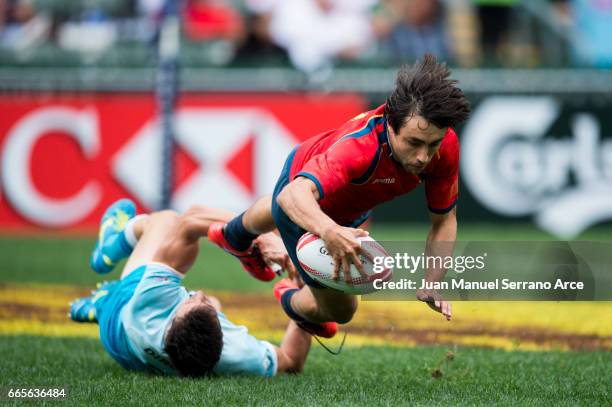 Pedro Martin of Spain scores a try for Uruguay on day one of the 2017 Hong Kong Sevens match at Hong Kong Stadium on April 7, 2017 in Hong Kong, Hong...