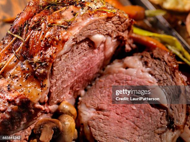 standing rib roast with lots of marbling - pot roast stock pictures, royalty-free photos & images