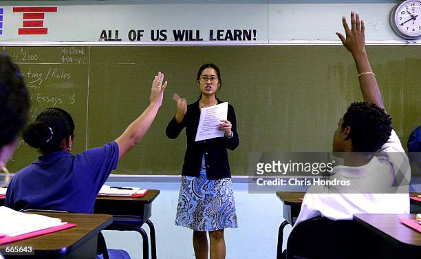 Teacher Tina Cheuk of "Knowledge is Power Program" Academy takes questions from her class October 4, 2000 in The Bronx, New York. The Knowledge Is...