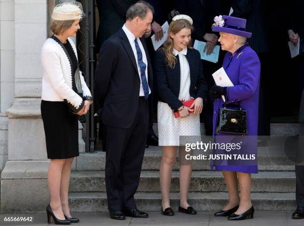 Britain's Queen Elizabeth II speaks to Serena Armstrong-Jones, Countess of Snowdon , David Armstrong-Jones , 2nd Earl of Snowdon, known as David...
