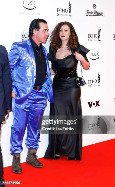 Rammstein singer Till Lindemann and model Leila Lowfire during the Echo award red carpet on April 6, 2017 in Berlin, Germany.