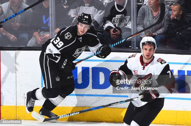 Adrian Kempe of the Los Angeles Kings skates against Anthony DeAngelo of the Arizona Coyotes during the game on April 2, 2017 at Staples Center in...