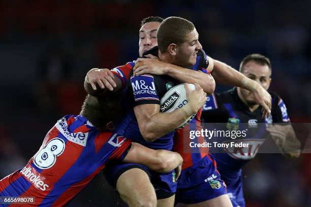 Brenko Lee of the Bulldogs is tackled during the round six NRL match between the Newcastle Knights and the Canterbury Bulldogs at McDonald Jones...