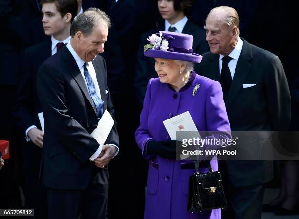 David Armstrong-Jones speaks to Queen Elizabeth II and Prince Philip, Duke of Edinburgh as they leave a Service of Thanksgiving for the life and work...