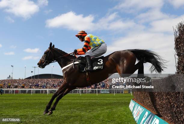 Might Bite ridden by Nico de Boinville clears the last on the way to victory during the Betway Mildmay Novices' Chase on Ladies Day at Aintree...