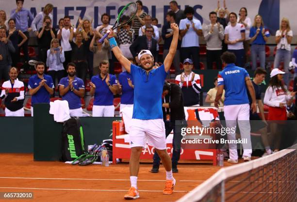 Lucas Pouille of France celebrates his victory during the singles match against Kyle Edmund of Great Britain on day one of the Davis Cup World Group...