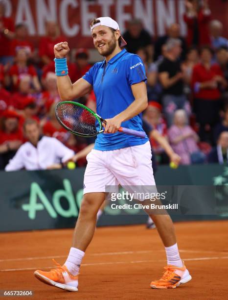 Lucas Pouille of France celebrates his victory during the singles match against Kyle Edmund of Great Britain on day one of the Davis Cup World Group...