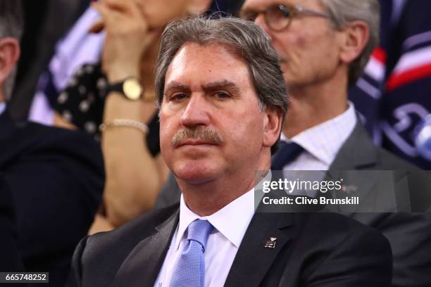 David Haggerty the President of the International Tennis Federation attends the during the singles match between Lucas Pouille of France and Kyle...