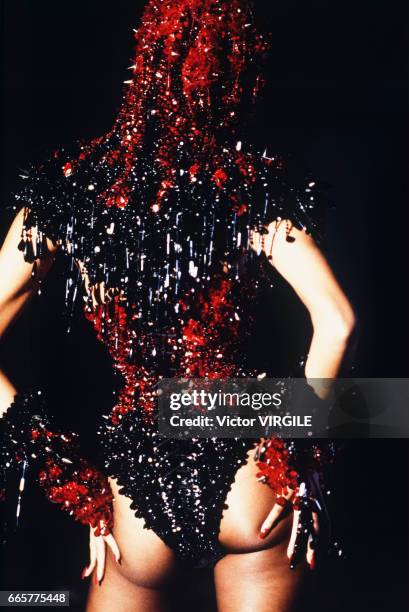 Yasmeen Ghauri walks the runway at the Thierry Mugler Ready to Wear Spring/Summer 1993 fashion show during the Paris Fashion Week in October, 1992 in...