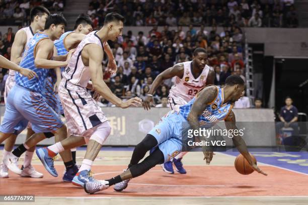 Darius Adams of Xinjiang Flying Tigers in action against Guangdong Southern Tigers in Game Four of the 2017 CBA Finals at Dongguan Basketball Center...