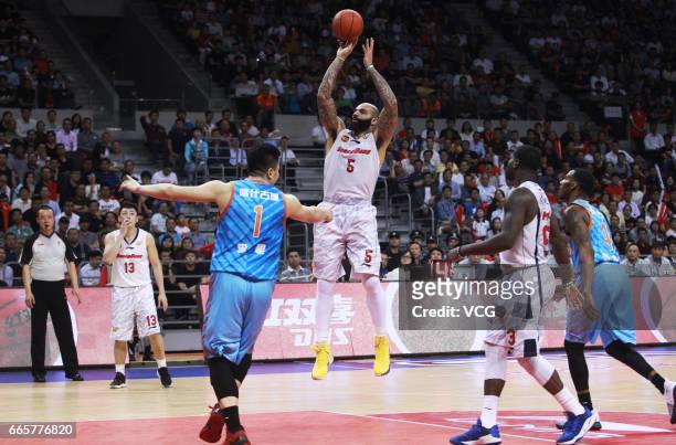 Carlos Boozer of Guangdong Southern Tigers shoots the ball against Xinjiang Flying Tigers in Game Four of the 2017 CBA Finals at Dongguan Basketball...
