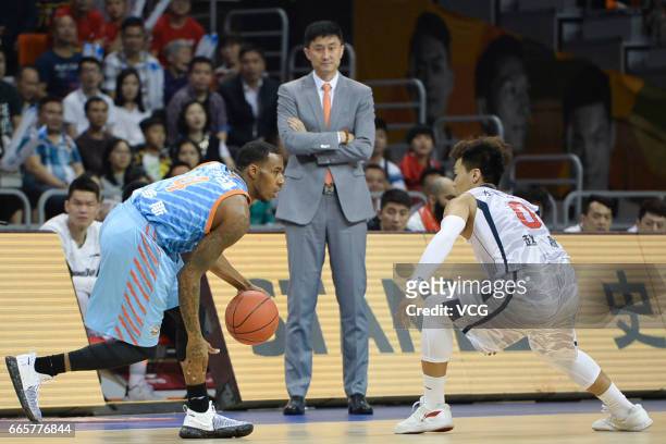 Darius Adams of Xinjiang Flying Tigers drives the ball against Zhao Rui of Guangdong Southern Tigers in Game Four of the 2017 CBA Finals at Dongguan...