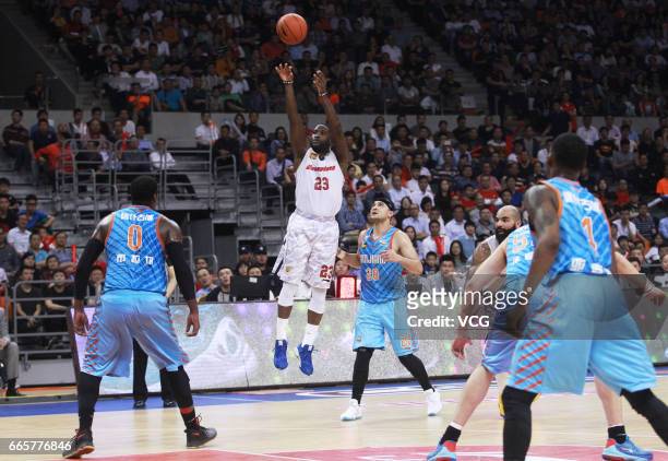 Donald Sloan of Guangdong Southern Tigers shoots the ball against Xinjiang Flying Tigers in Game Four of the 2017 CBA Finals at Dongguan Basketball...