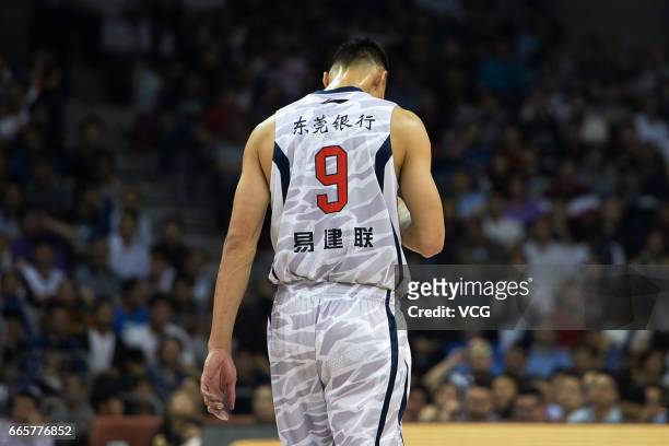 Yi Jianlian of Guangdong Southern Tigers reacts against Xinjiang Flying Tigers in Game Four of the 2017 CBA Finals at Dongguan Basketball Center on...