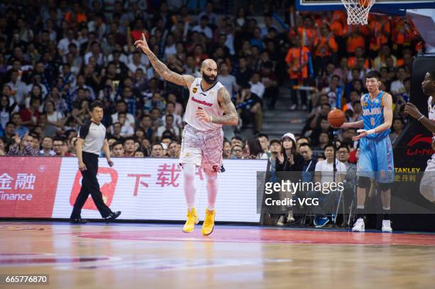 Carlos Boozer of Guangdong Southern Tigers reacts against Xinjiang Flying Tigers in Game Four of the 2017 CBA Finals at Dongguan Basketball Center on...