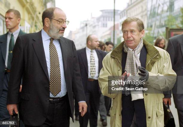Czech President Vaclav Havel, right, and Italian writer Umberto Eco, the author of "Foucault's Pendulum" and "The Name of the Rose," walk together...