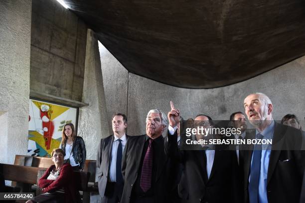 French President Francois Hollande looks on during a visit of the Ronchamp Chapel on April 7, 2017 in Ronchamp, eastern France. / AFP PHOTO /...