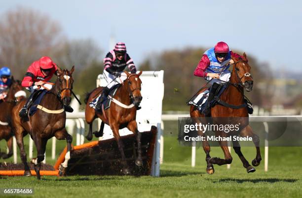 The Worlds End ridden by Adrian Heskin clears the last on the way to victory during the Doom Bar Sefton Novices' Hurdle on Ladies Day at Aintree...