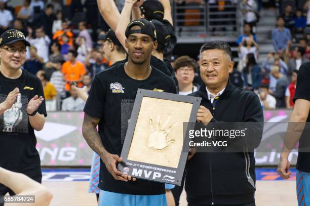 Darius Adams of Xinjiang Flying Tigers is named MVP of the CBA Finals after defeating Guangdong Southern Tigers in Game Four of the 2017 CBA Finals...