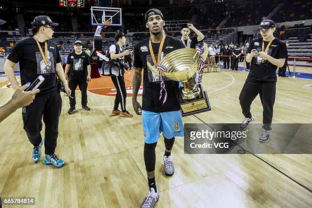 Darius Adams of Xinjiang Flying Tigers celebrates after defeating Guangdong Southern Tigers in Game Four of the 2017 CBA Finals at Dongguan...