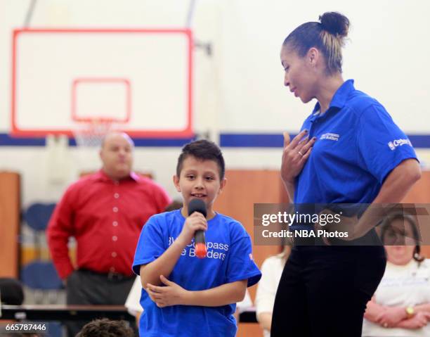 McALLEN, TX WNBA legend Allison Feaster answers questions from a young fan at Victor Fields Elementary School in McAllen, Texas. BBVA Compass and...