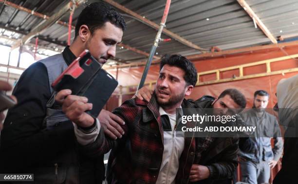 The grieving father of one-year-old infant Amira asks for one final picture with her in a make-shift morgue, after she died in a reported air strike...