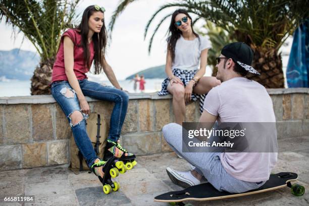 skating squad on a break - girl with legs open stock pictures, royalty-free photos & images