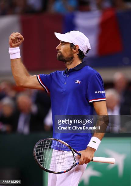 Jeremy Chardy of France celebrates victory during the singles match against Daniel Evans of Great Britain on day one of the Davis Cup World Group...