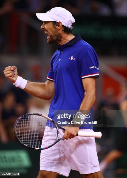 Jeremy Chardy of France celebrates victory during the singles match against Daniel Evans of Great Britain on day one of the Davis Cup World Group...