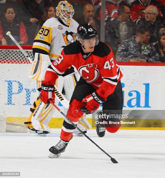 Ben Thomson of the New Jersey Devils skates against the Pittsburgh Penguins at the Prudential Center on April 6, 2017 in Newark, New Jersey. The...