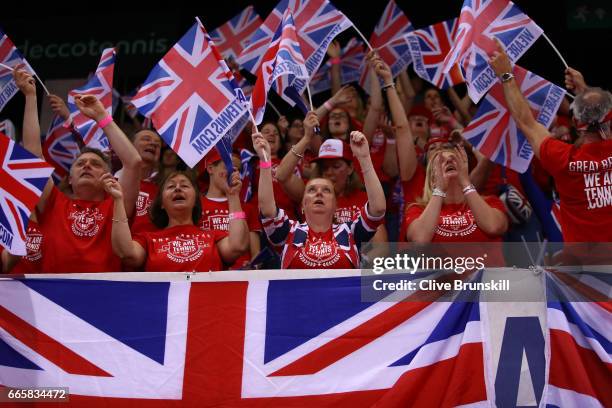 Great Britain cheer on their team during the singles match between Jeremy Chardy of France and Kyle Edmund of Great Britain on day one of the Davis...