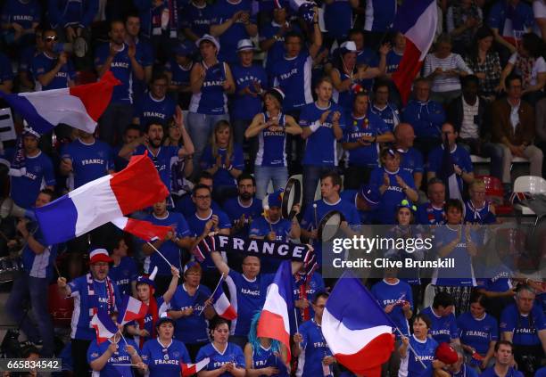 France fans cheer on their team during day one of the Davis Cup World Group Quarter-Final between France and Great Britain at Kindarena on April 7,...