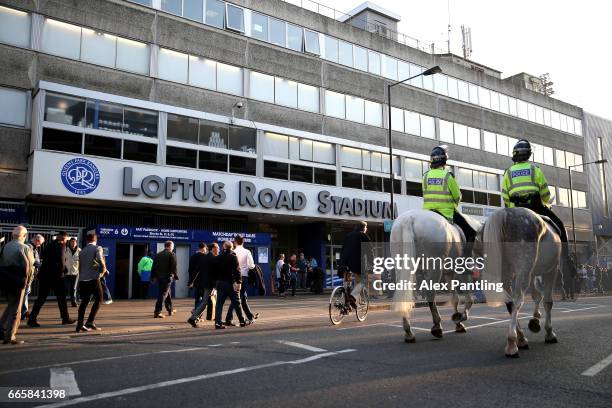 Police are pictured outside the stadium prior to the Sky Bet Championship match between Queens Park Rangers and Brighton & Hove Albion at Loftus Road...