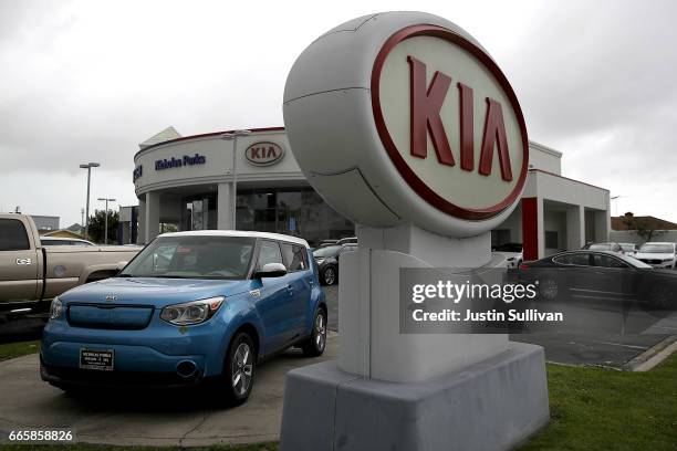 Sign with the Kia logo displayed at a Hyundai dealership on April 7, 2017 in San Leandro, California. South Korean automakers Kia and Hyundai...