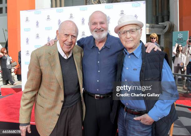 Honorees Carl Reiner and Rob Reiner and producer Norman Lear attend the Carl and Rob Reiner Hand and Footprint Ceremony during the 2017 TCM Classic...