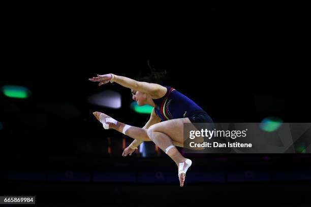 Ana Perez of Spain takes part in a practice session on beam during previews to the iPro Sport World Cup of Gymnastics at The O2 Arena on April 7,...