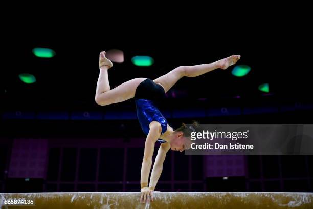 Tabea Alt of Germany takes part in a practice session on the beam during previews to the iPro Sport World Cup of Gymnastics at The O2 Arena on April...