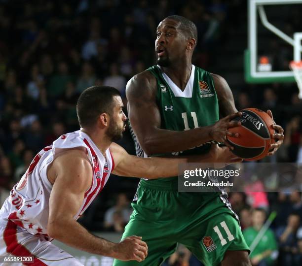 Brad Wanamaker of Darussafaka Dogus in action against Nate Wolters and Charles Jenkins of FK Crvena Zvezda during the Turkish Airlines Euroleague...