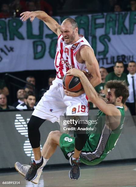 Birkan Batuk of Darussafaka Dogus in action against Marco Simonovic of FK Crvena Zvezda during the Turkish Airlines Euroleague basketball match...