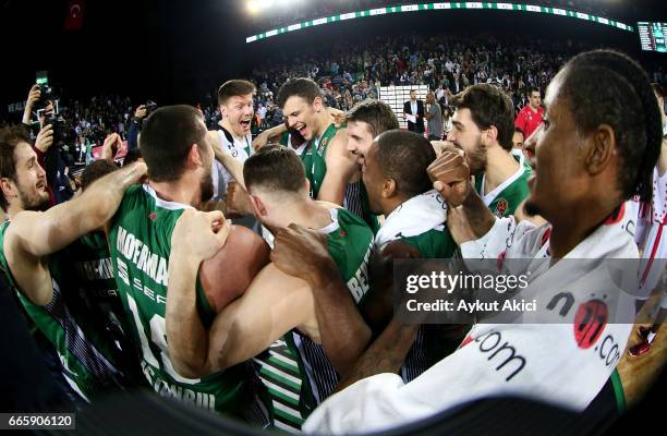 Players of Darussafaka Dogus Istanbul celebrate victory during the 2016/2017 Turkish Airlines EuroLeague Regular Season Round 30 game between...