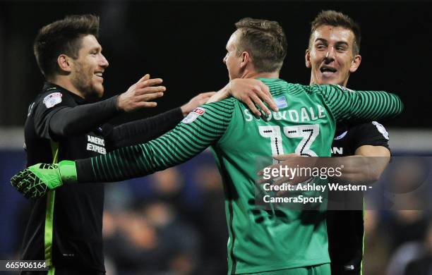 Brighton & Hove Albion's David Stockdale celebrates at the final whistle with Sebastien Pocognoli and Uwe Hunemeier after the Sky Bet Championship...