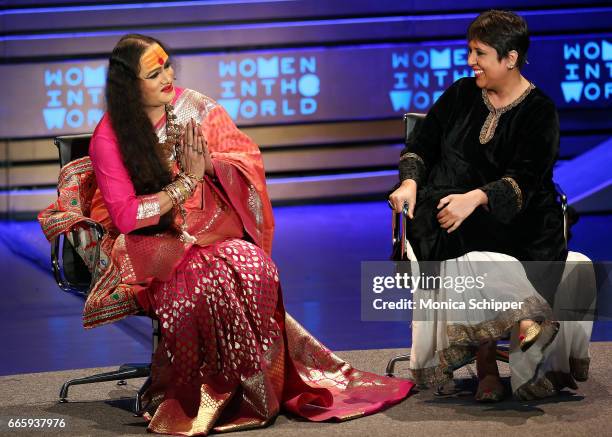 Laxmi Narayan Tripathi and Barkha Dutt speak on stage at the 8th Annual Women In The World Summit at Lincoln Center for the Performing Arts on April...