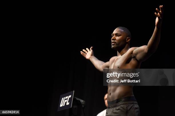 Anthony Johnson steps on the scale during the UFC 210 weigh-in at KeyBank Center on April 7, 2017 in Buffalo, New York.