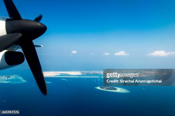 aerial scenery of velena airport of malé, maldives. - male maldives stock-fotos und bilder